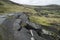 Landscape of collapsed A625 road in Peak District UK