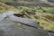 Landscape of collapsed A625 road in Peak District UK