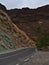 Landscape with colorful volcanic rocks at Los Azulejos De Veneguera in the western mountains of Gran Canaria, Spain.