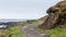 Landscape composition of a windy path beside the coast