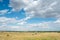 Landscape country daylight village blue sky clouds field hills