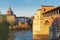 Landscape of covered bridge and Pavia cathedral at sunny day