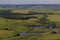 Landscape with cows, lake, forest. View from the mountain Toratau