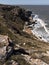 Landscape of Crimean sea shore. Empty rocky beach and cliffs in sunny day