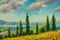 Landscape with cypress trees on colorful flowered field in Tuscany, Italy.