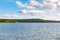 landscape day view at Canadian Ontario Beech lake in Muskoka area. Canadian forest nature and water reservoir.