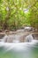 Landscape of deep forest waterfall in National Park, Kanjanaburi, Thailand.