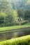 A landscape of dense trees with a canal in Yorkshire England