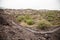 Landscape of a deserted arid area with little vegetation