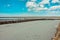 Landscape of a deserted salt lake. The texture of salt formations in the foreground. salt lake surface, dry salt lake, white salt