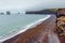 Landscape of Dyrholaey cape, volcanic sand beach, South Iceland.