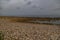 landscape empty rocky beach on a cloudy day spain