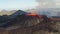Landscape of erupting Mauna Loa Volcano in Hawaii with smoke under blue sky