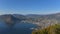 Landscape with fabulous lake view from the top of the mountain, with a view of the city