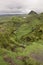 Landscape of the famous Quiraing tree in Isle of Skye with dark clouds