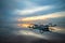 Landscape. Fisherman boat jukung. Traditional fishing boat at the beach during sunrise. Sanur beach, Bali, Indonesia