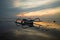 Landscape. Fisherman boat jukung. Traditional fishing boat at the beach during sunrise. Sanur beach, Bali, Indonesia