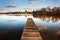 Landscape of fishing jetty on calm lake