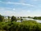 Landscape of flooded marshes and bright blue skies