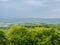 The landscape with forest and electric windmills in Germany