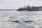 Landscape with frozen river Dnepr and Orthodox church