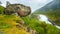 Landscape with Giant Tall Waterfall in the Valley