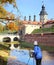 Landscape with girl artist in the open air painting a landscape with a beautiful medieval castle.