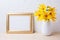 Landscape golden frame mockup with yellow rosinweed flowers
