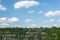 landscape of a granite quarry against a summer cloudy sky