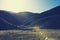 Landscape grassland and mountain in sunrise