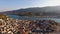 Landscape Greek island of Poros amidst the Mediterranean, with a bird`s-eye view, aerial video shooting, many moored to
