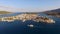 Landscape of the Greek island Poros among the Mediterranean Sea, bird`s eye view, aerial video shooting, many yachts