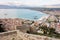 Landscape of Greek Nafplio city, Bourtzi fortress with the harbour, pier and the ancient stone walls of the Fortress of Palamidi