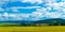 Landscape with green grass on a field and beautiful sky, Bashkortostan, Russia
