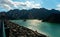 Landscape of the Hatta Dam under sunlight and a cloudy sky in Dubai