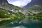 Landscape of the High Tatra mountains. Lake Velicke pleso, waterfall Velicky vodopad and mountains. Slovakia