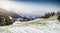 Landscape of highland meadows covered in snow at Austrian Alps