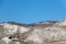 Landscape on a hill or ridge with rocks and trees on top of the mountain.