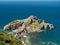 Landscape of the historic San Juan Gaztelugatxe fort surrounded by the sea in Spain