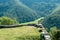 Landscape with Hohenurach Castle near Bad Urach, Germany. Person is on ruins of German medieval castle on mountain top