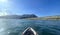 Landscape horizontal outdoor kayaking water sport adventure on ocean with mountain and blue sky