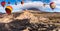 Landscape with hot air balloons flying in Teide National Park