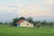 Landscape of a house in the middle of a rice field