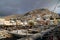 A landscape of the houses on top of the hill from the harbour in Calymnos Island