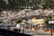 A landscape of the houses on top of the hill from the harbour in Calymnos Island