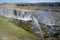 Landscape with huge Dettifoss waterfall with a double rainbow, Iceland