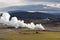 Landscape in Iceland with a plume of smoke, Krafla geothermal po