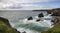 Landscape image of Bedruthan Steps, famous rock stacks in Cornwall England