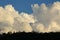 Landscape image, large cloud on sky above mountain hill