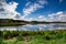 Landscape image of the marsh with reflection of clouds sky at Bombay Hook NWR.